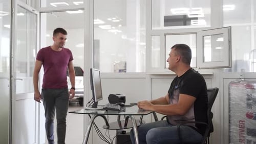 Customer Receives Keys at Car Dealership Successful Deal Completion Man Smiling Accepts Vehicle Keys