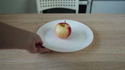 Fresh Apple on Plate Displayed