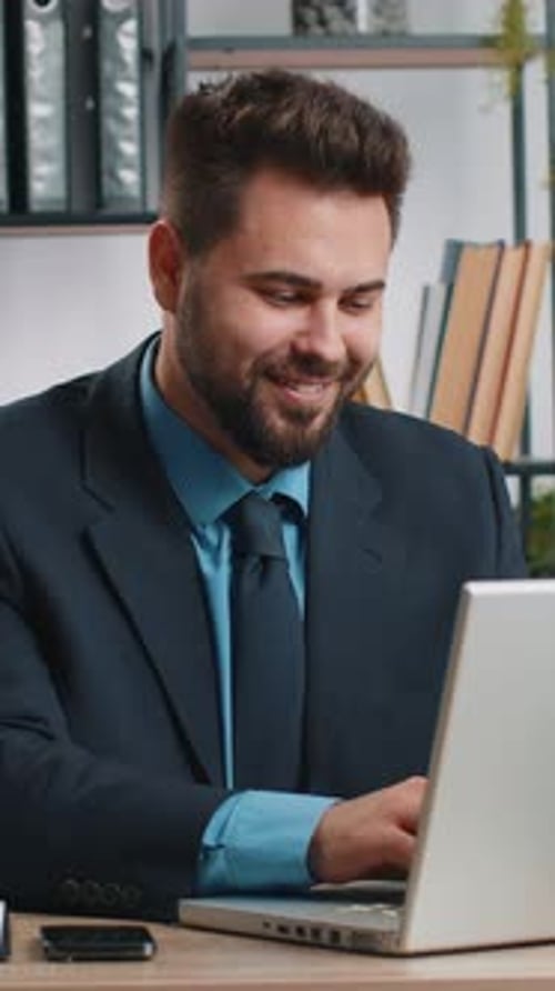 Caucasian Business Man Freelancer at Office Start Working on Laptop Computer Sends Online Messages