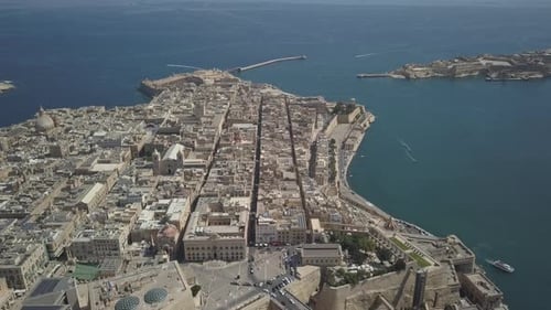 Aerial drone shot flying above Valletta, the capital city of Malta