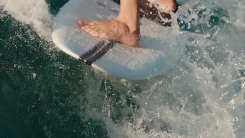 Surfer Riding Wave Close Up Perspective