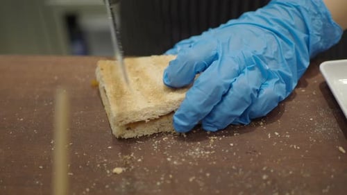 Preparing a Simple Butter Sandwich in a Cafe Kitchen
