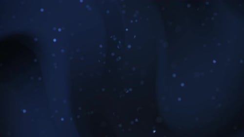 Abstract Floating Blue Particles Loop Background