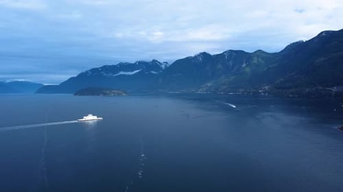 AERIAL Shot of a Ferry Sailing across British Columbia, Canada