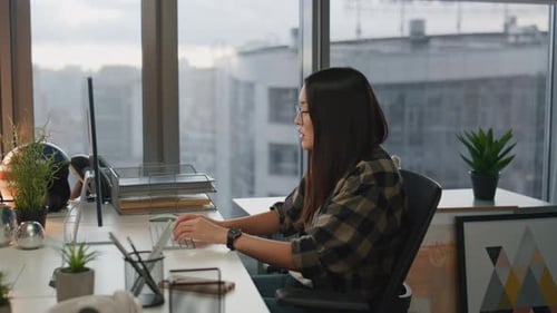 Positive Colleagues Discussing At Office Closeup. Business Couple Talking To Each Other At Hipste...