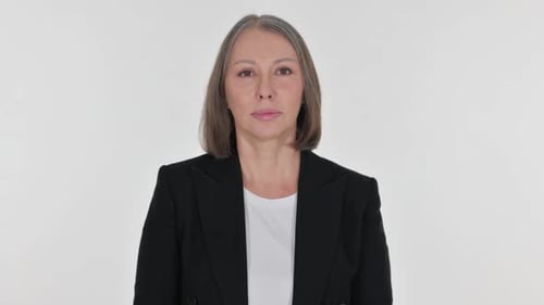 Serious Senior Businesswoman on White Background