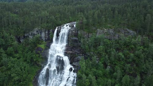 Waterfall in mountains. Outdoor nature in Norway