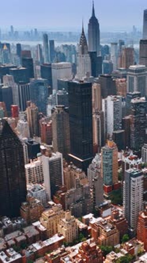 Stunning architecture of New York Midtown on clear sunny day. Amazing city scenery from top view.