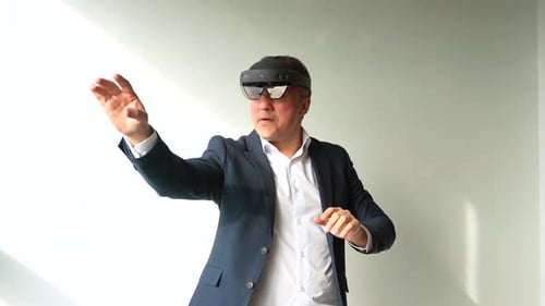 Man Using Mixed Reality Goggles in the Office