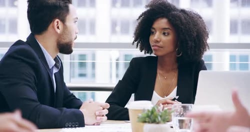 Business Meeting and Handshake in Modern Office