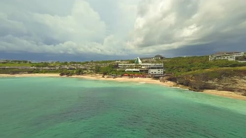 Aerial view of a beachside resort in Kuta Bali on a cloudy day
