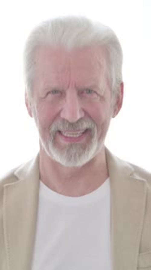Senior Man Smiling in Portrait, Wearing White T-Shirt