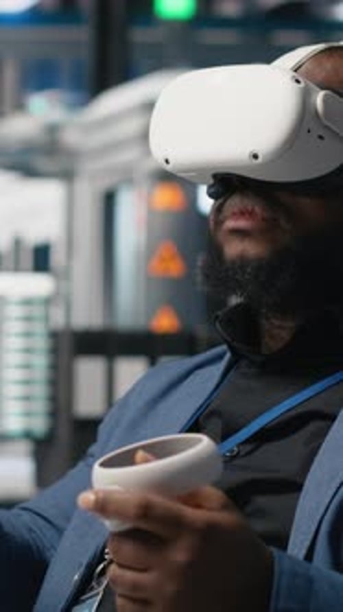 Vertical Video Photovoltaics Manufacturing Plant Analyst Works with VR Gear