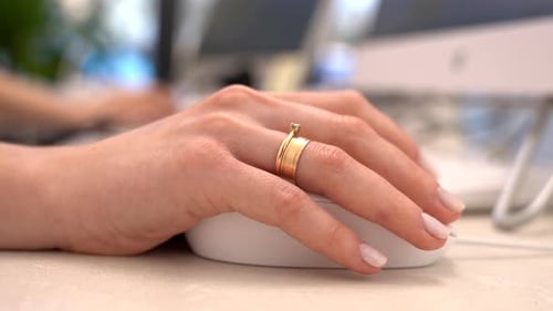 Close Up of Businesswoman Hand Using Mouse Working on Computer Technology and Business Concept