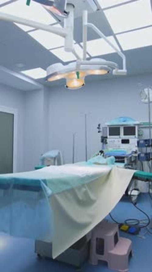 Clean Operating Room with Surgical Lights and Equipment