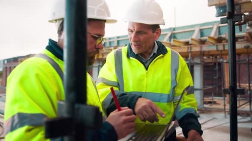 Manager, team and talk on construction site with laptop, advice and collaboration for engineering