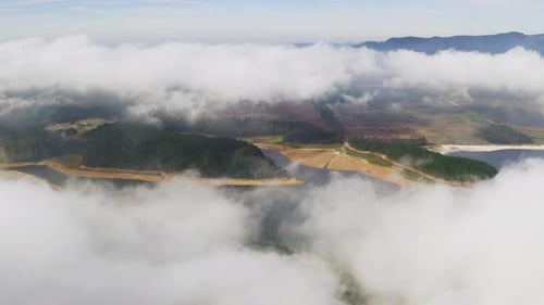 Clouds high above a mountainous area