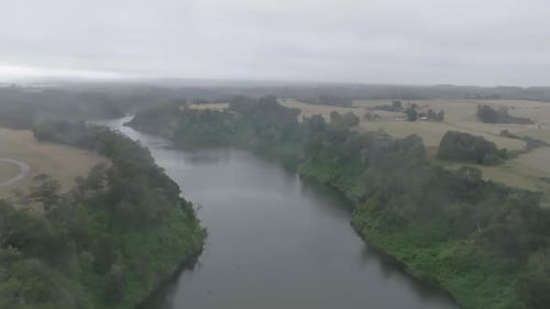 Mountain Valley with River Flowing to Blue Lake
