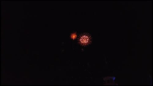 Double firework with golden sparkles