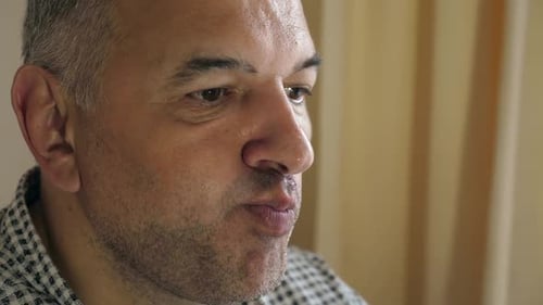 Man Eating and Chewing Food Close Up