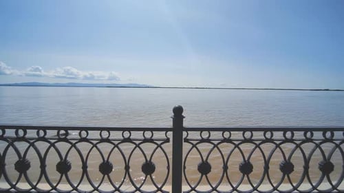 Embankment with a Black Fence