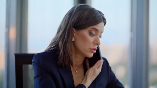 Portrait Dissatisfied Businesswoman Calling Cellphone at Office Workplace