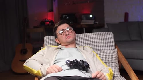 Man Playing Video Games in his Living Room