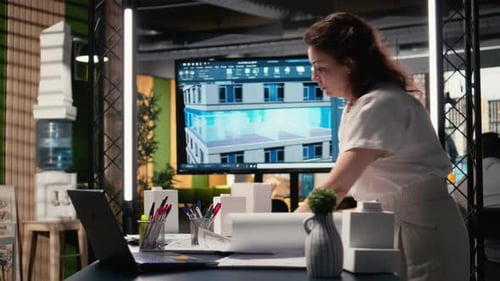 Real Estate Developer Reviews Master Plan with Construction Layouts