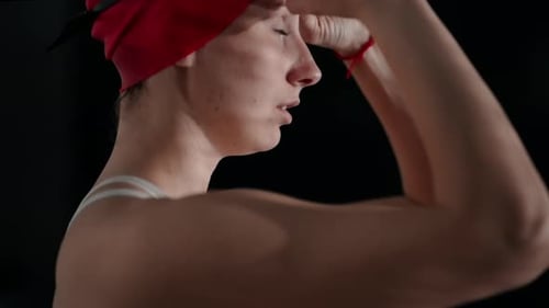 Professional Sportswoman Swimmer Preparing To Plunge In Swimming Pool Putting Eyeglasses