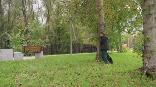 Calm Outdoor Scene Captures Tranquility Serene Individual Enjoying Peaceful Park Surroundings Person