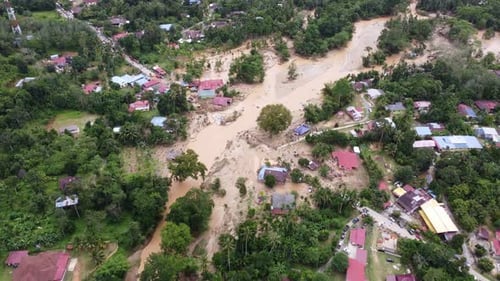 Aerial view flash flood cause the breakage of road and bridge