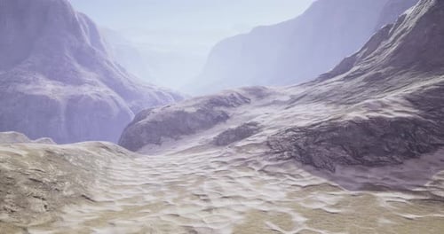 Detailed Landscape View of Rocky Terrain with Distant Mountains During Daylight