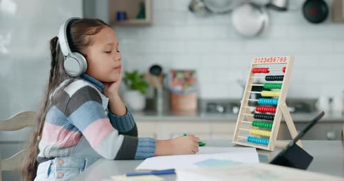 Home school, yawn and tired child with tablet, headphones and fatigue while learning with video