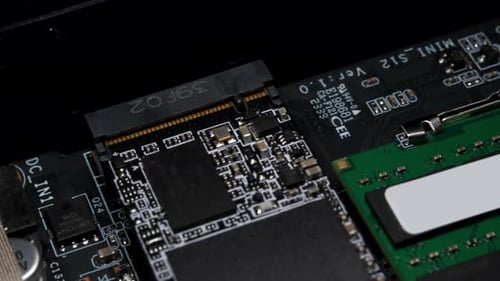 CloseUp Inspection of Circuit Board Component Integration in a Tech Laboratory