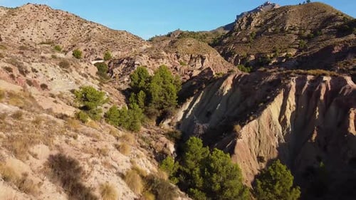 Rugged topography of cliffs and canyons in the harsh landscape of Monnegre in the Alicante Province