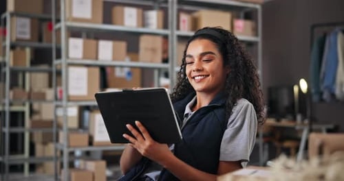 Tablet, logistics and woman in warehouse for distribution stock with cardboard boxes on shelf