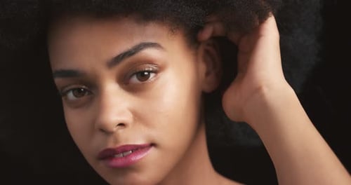 Woman with Natural Hair Posing