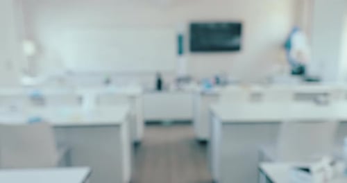 Science, classroom and blur with empty room of laboratory for learning, chemistry and technology