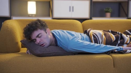 Man sleeping at home.
