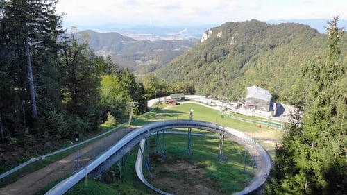 Thrilling bobkart track slide summer attraction Celje Slovenia