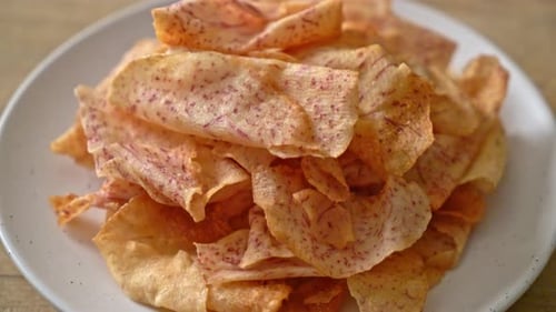Delicious Taro Chips Piled on White Plate