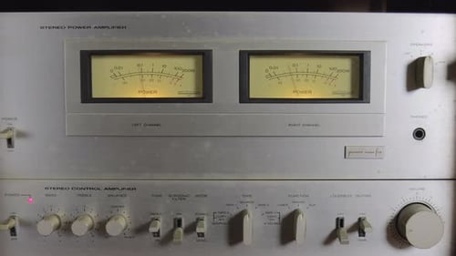 An Old Vintage Amplifier Showing The Level Of Watts For The Left And Right Channel - Close Up Shot