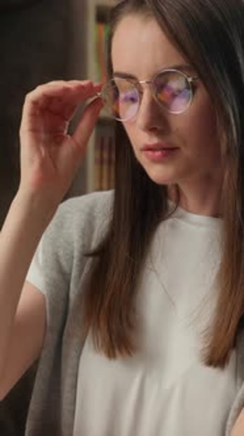 Tired Caucasian Woman Removing Glasses Eyes Strain Pain Headache in Library Stressed Student Female