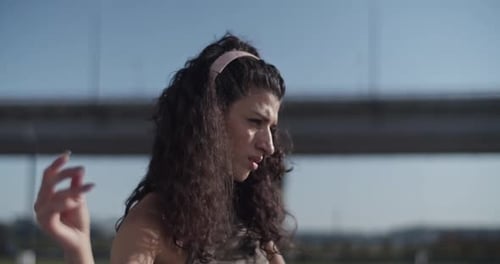 Young Woman Moving Shoulders During Dance