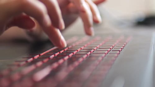 Typing on Laptop Keyboard in Close Up