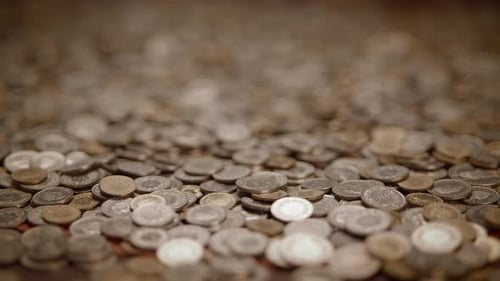 Pile of Coins Panning Close Up