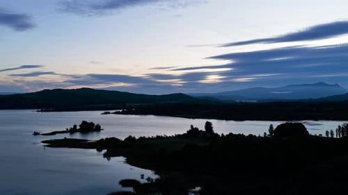 Scenic Lake and Mountain Silhouette at Blue Hour