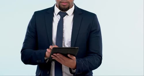 Tablet, typing and business man in studio scroll for online planning, website review