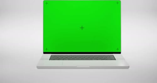 Green Screen Display Laptop Opens And Zoom In On A White Background