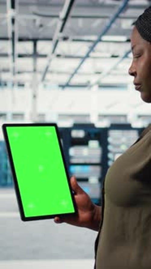 Vertical Video Software Developer in Data Center Using Green Screen Tablet